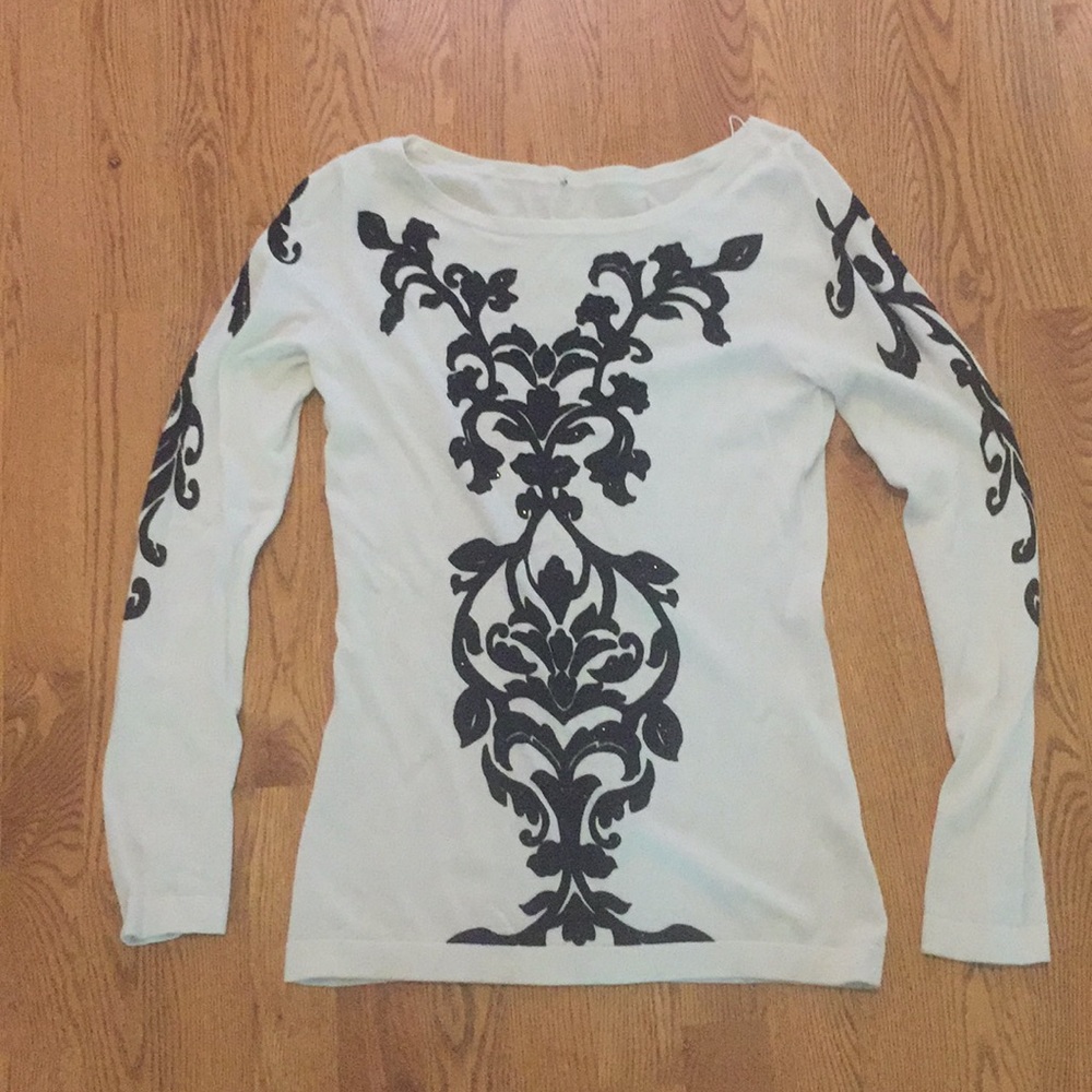 White and black sweater